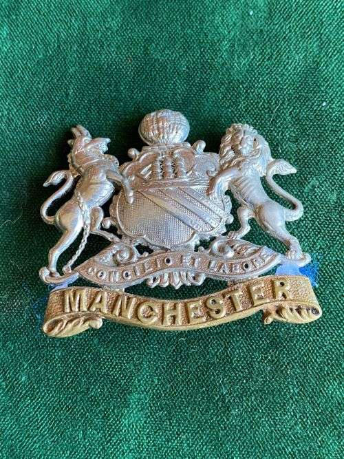 MANCHESTER REGT. CAP BADGE-1889-1923-PART SLIDER