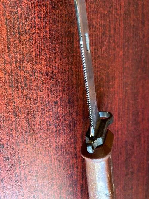 RUSSIAN MADE AKM 11 BAYONET-THE RUBBER SECTION ON THE SCABBARD PROVIDES A HAND GRIP WITH ELECTRICAL