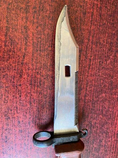 RUSSIAN MADE AKM 11 BAYONET-THE RUBBER SECTION ON THE SCABBARD PROVIDES A HAND GRIP WITH ELECTRICAL