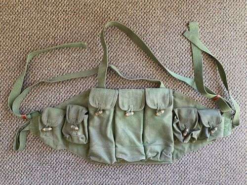 CHI COM TYPE 56 CHEST RIG IN VERY GOOD CONDITION-THREE MAG TYPE WITH TWO SMALLER POCKETS ON EACH SID
