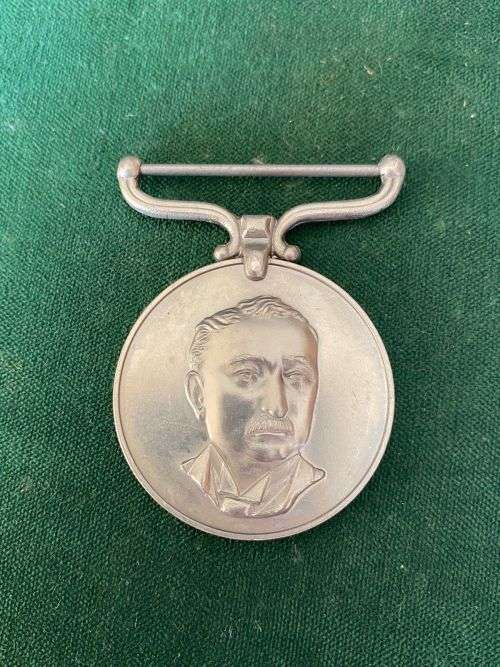 RHODESIA DISTRICT SERVICE MEDAL NAMED TO G. GUNDA D.S.A. DISTRICT SECURITY ASSISTANT