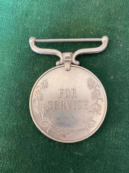 RHODESIA DISTRICT SERVICE MEDAL NAMED TO G. GUNDA D.S.A. DISTRICT SECURITY ASSISTANT