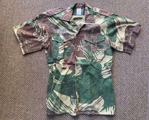 RHODESIA CAMO SHORT SLEEVE SHIRT,WITH STATESMAN MAKERS LABEL-SIZE SMALL-MEASURES 46 CM ARMPIT TO ARM