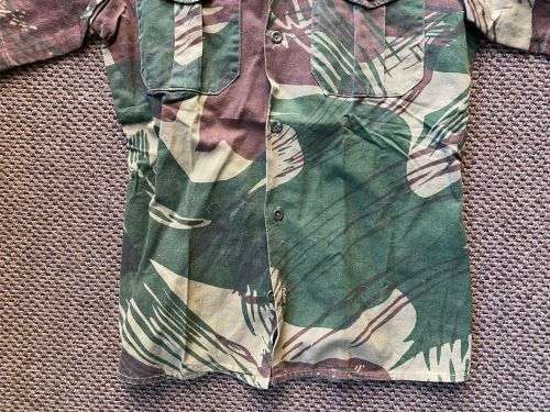 RHODESIA CAMO SHORT SLEEVE SHIRT,WITH STATESMAN MAKERS LABEL-SIZE SMALL-MEASURES 46 CM ARMPIT TO ARM