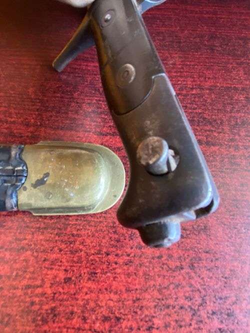 ITALIAN 1870/15 WITH THE RIGHT HILT SHOWING THE ORIGINAL LONG LEAF SPRING-BRASS MOUNTED LEATHER SCAB