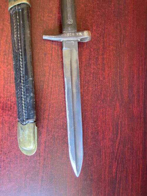 ITALIAN 1870/15 WITH THE RIGHT HILT SHOWING THE ORIGINAL LONG LEAF SPRING-BRASS MOUNTED LEATHER SCAB