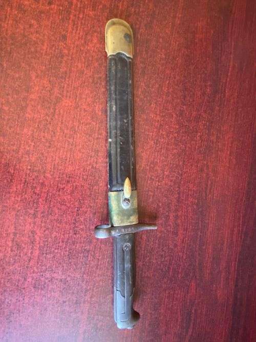 ITALIAN 1870/15 WITH THE RIGHT HILT SHOWING THE ORIGINAL LONG LEAF SPRING-BRASS MOUNTED LEATHER SCAB