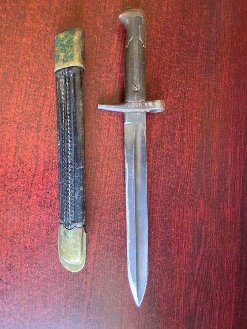 ITALIAN 1870/15 WITH THE RIGHT HILT SHOWING THE ORIGINAL LONG LEAF SPRING-BRASS MOUNTED LEATHER SCAB