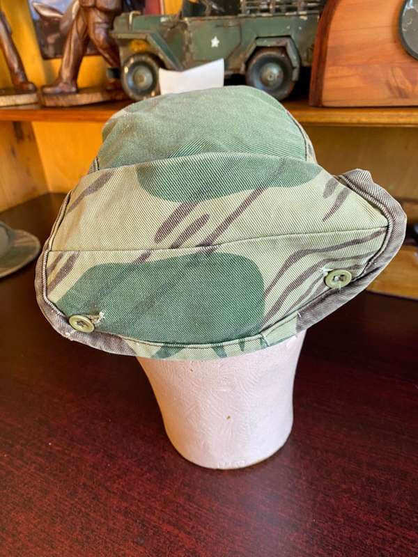 RHODESIAN CAMO FLAP CAP-USED BUT GOOD CONDITION-INSIDE RING MEASURES 56 CM