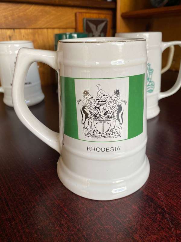 RHODESIA MUG WITH WILLGROVE WARE POTTERY,MAKERS STAMP-HEIGHT 14 CM-DIAMETER AT THE BOTTOM 11CM-GOOD