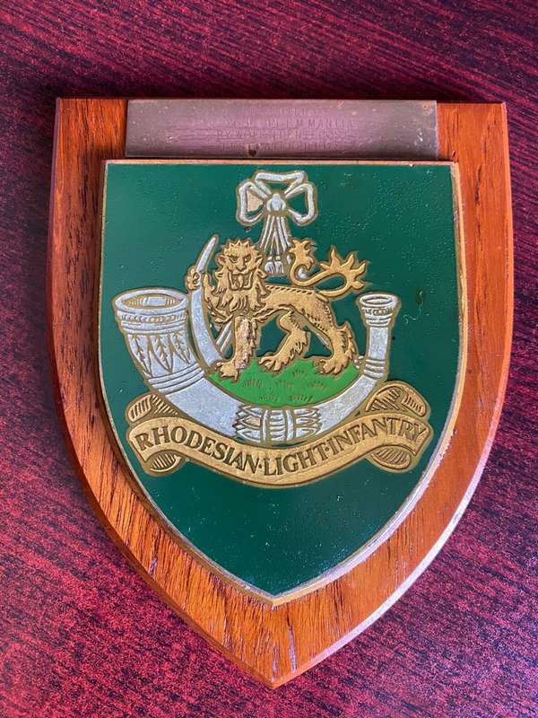 RHODESIAN LIGHT INFANTRY-PLAQUE,PRESENTED TO 727686 CPL. F.M. MANTIA BY WO1 F.N. PENTECOST