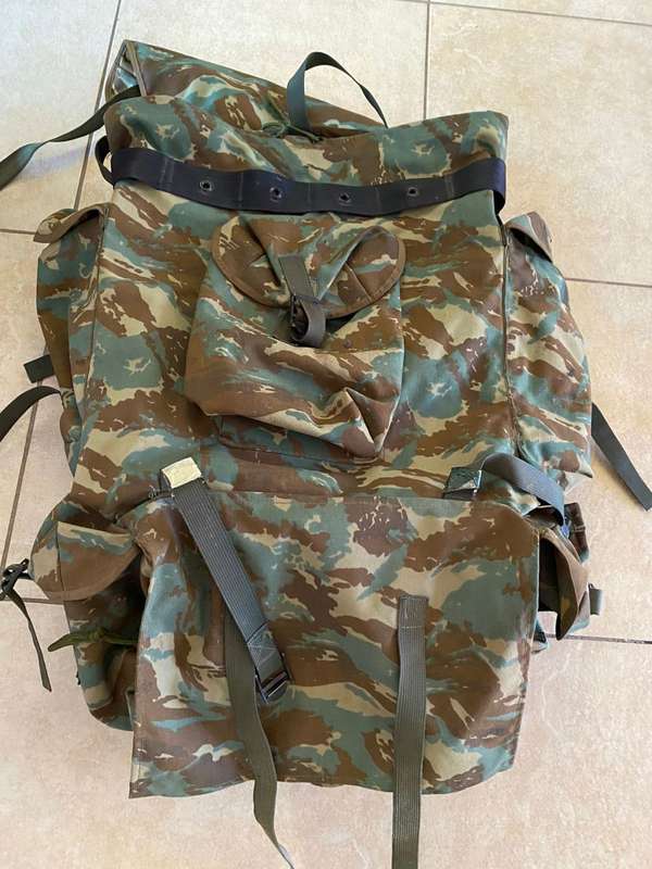 32 BATTALION,LARGE BACK PACK,WITH METAL H FRAME-PLEASE HAVE A LOOK AT PICS PLACED-THIS IS HOW I GOT