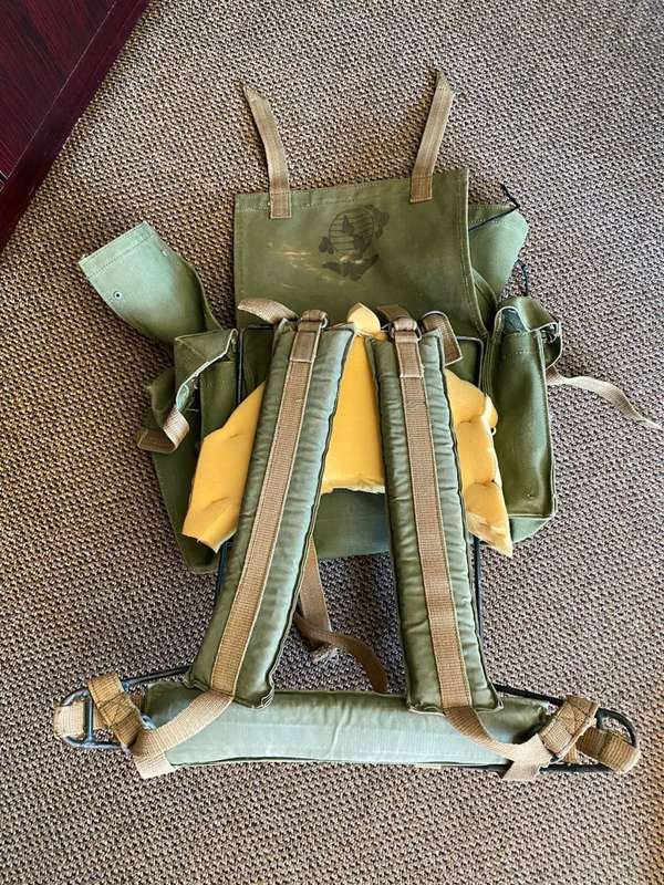 RHODESIAN MILITARY ISSUE BACKPACK WITH METAL FRAME AND SLEEPING BAG COVER-LOOKING AT THE LOGO ON THE