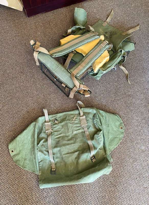 RHODESIAN MILITARY ISSUE BACKPACK WITH METAL FRAME AND SLEEPING BAG COVER-LOOKING AT THE LOGO ON THE