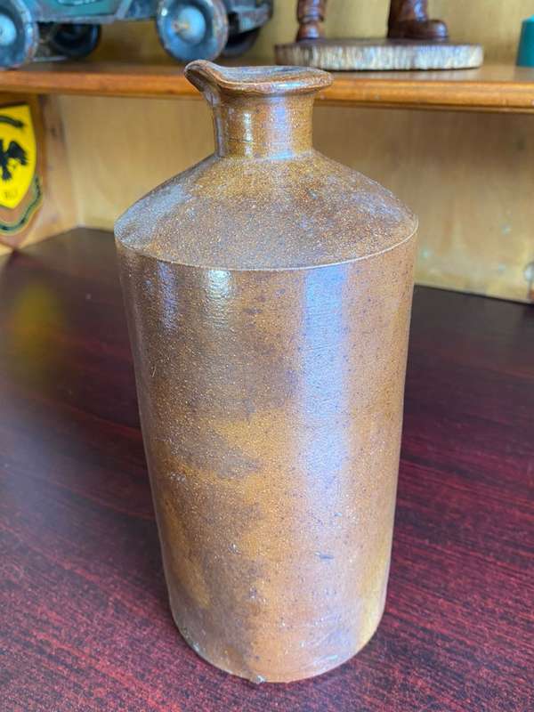 VERY LARGE WATT & LOVETT STONEWARE INK,BOTTLE WITH POURING LIP-GOOD CONDITION-DIAMETER AT BOTTOM 110