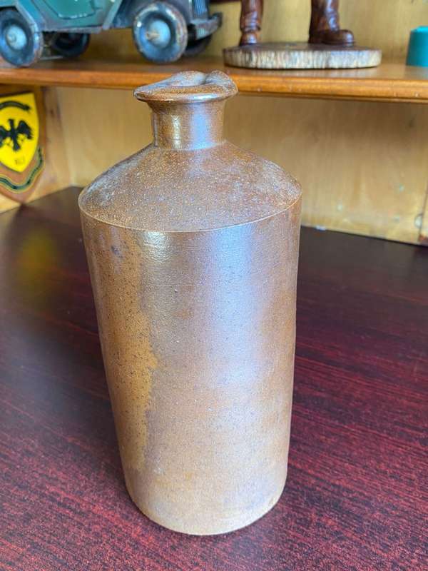 VERY LARGE WATT & LOVETT STONEWARE INK,BOTTLE WITH POURING LIP-GOOD CONDITION-DIAMETER AT BOTTOM 110