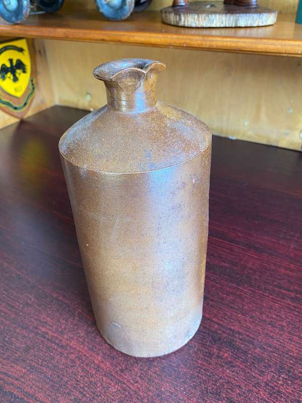 VERY LARGE WATT & LOVETT STONEWARE INK,BOTTLE WITH POURING LIP-GOOD CONDITION-DIAMETER AT BOTTOM 110
