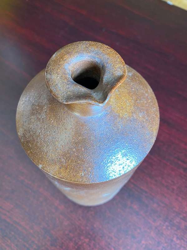 VERY LARGE WATT & LOVETT STONEWARE INK,BOTTLE WITH POURING LIP-GOOD CONDITION-DIAMETER AT BOTTOM 110