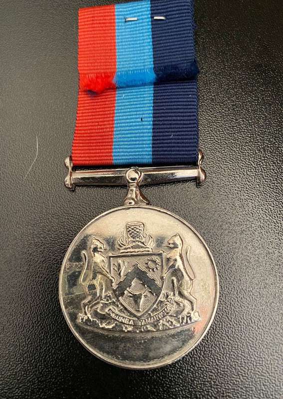 FULL SIZE TRANSKEI FAITHFUL SERVICE MEDAL FOR 10 YEARS OUTSTANDING AND DEVOTED SERVICE