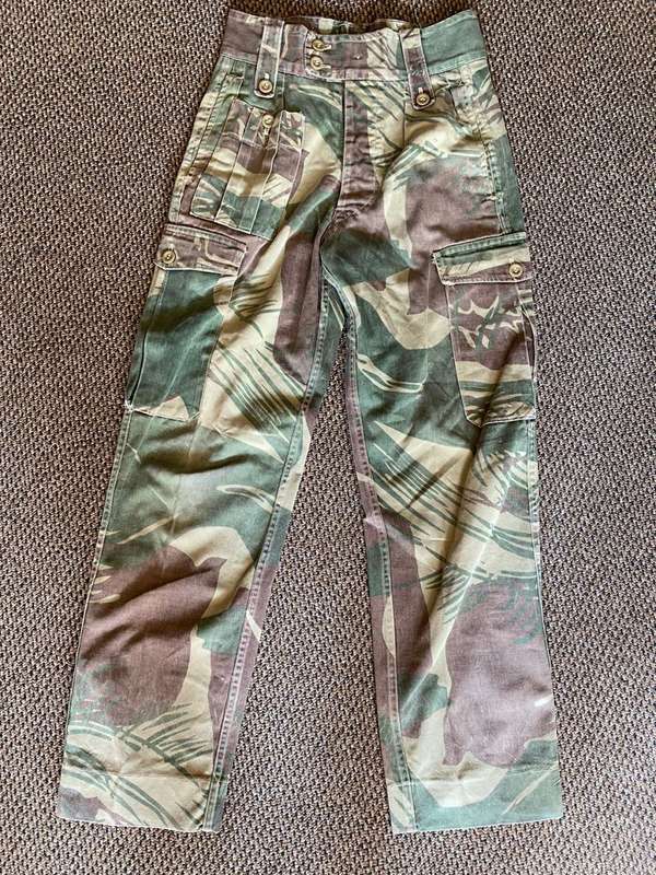 ORIGINAL BATTLE USED,RHODESIAN CAMO TROUSERS SIZE 28-INSIDE LEG MEASURES 71 CM-ALL BUTTONS INTACT-US