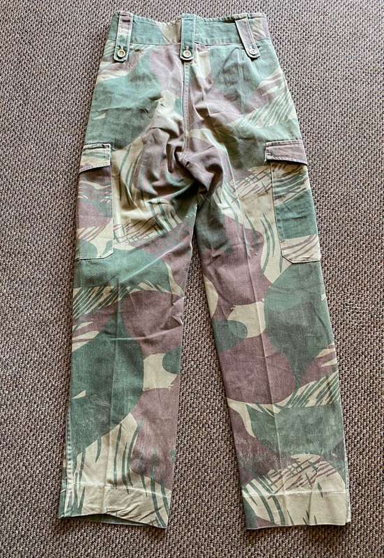 ORIGINAL BATTLE USED,RHODESIAN CAMO TROUSERS SIZE 28-INSIDE LEG MEASURES 71 CM-ALL BUTTONS INTACT-US