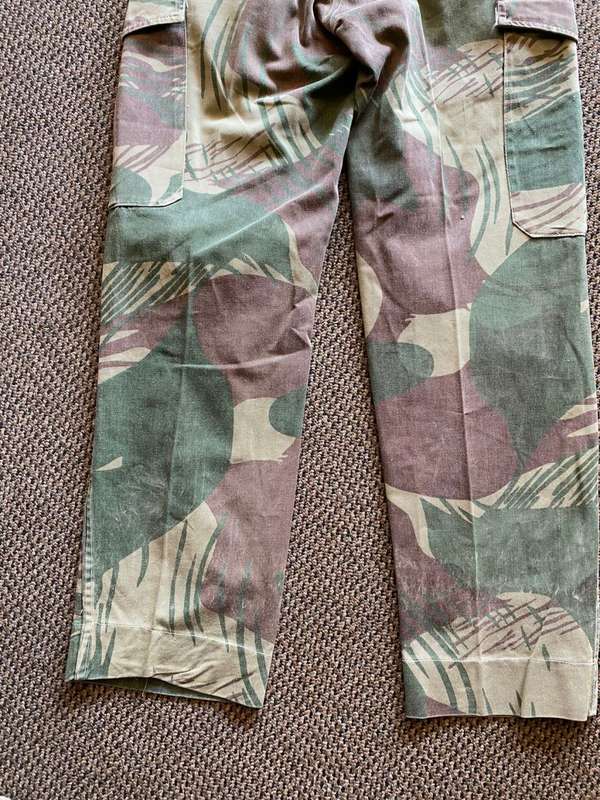 ORIGINAL BATTLE USED,RHODESIAN CAMO TROUSERS SIZE 28-INSIDE LEG MEASURES 71 CM-ALL BUTTONS INTACT-US