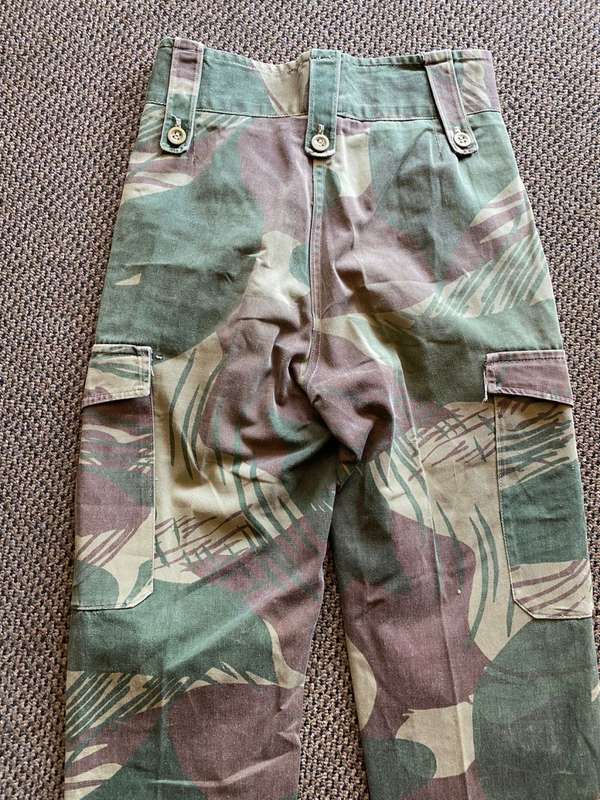 ORIGINAL BATTLE USED,RHODESIAN CAMO TROUSERS SIZE 28-INSIDE LEG MEASURES 71 CM-ALL BUTTONS INTACT-US