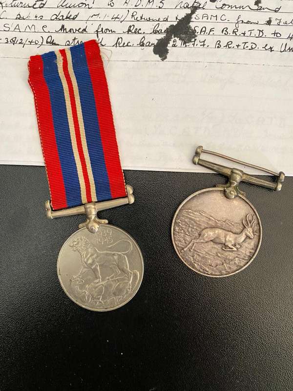 WAR MEDAL 1939-45-AFRICA SERVICE MEDAL 3116 J.B. MC CANN-ATTESTED B BATTERY NATAL FIELD ARTILLERY 21