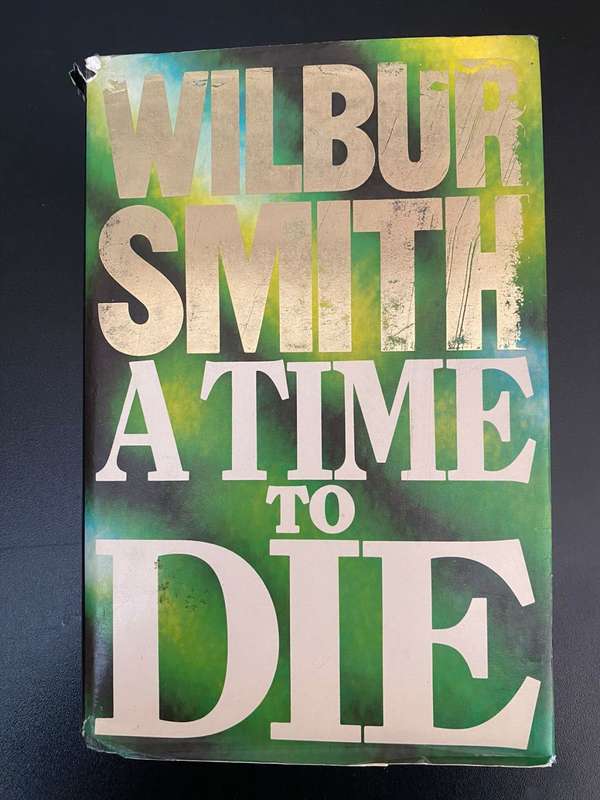 WILBUR SMITH-A TIME TO DIE-HARDCOVER WITH DUST COVER-FIRST EDITION PUBLISHED 1989