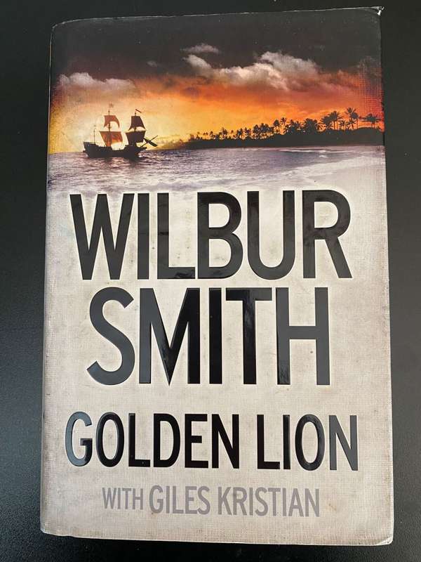 WILBUR SMITH-GOLDEN LION-HARDCOVER WITH DUST COVER-FIRST EDITION PUBLISHED 2015
