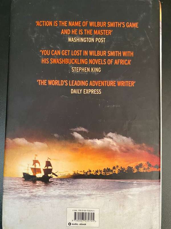 WILBUR SMITH-GOLDEN LION-HARDCOVER WITH DUST COVER-FIRST EDITION PUBLISHED 2015