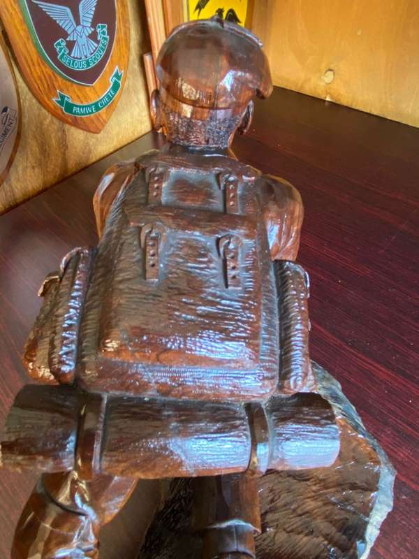 EXTREMELY WELL CARVED,WITH A LOT OF DETAIL OF A RHODESIAN SELOUS SCOUT SOLDIER-SIGNED AND DATED 1976