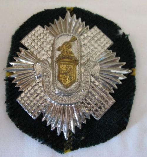 CAPE TOWN HIGHLANDERS BI-METAL TAM O' SHANTER BADGE.  WORN FROM 1920.  2 LUGS