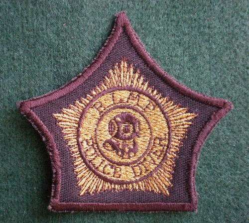 LESOTHO MOUNTED POLICE DIVER'S HELMET BADGE-YELLOW EMBROIDERED ON BROWN-RARE