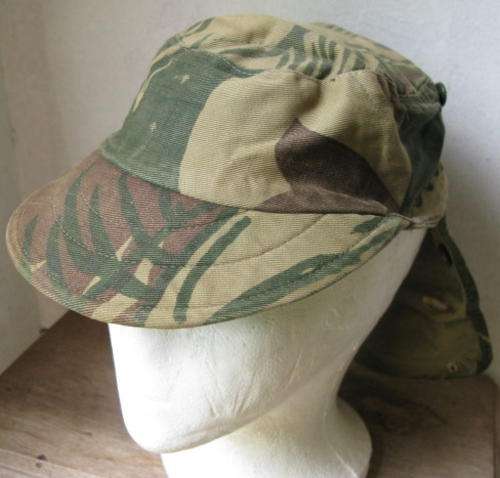 RHODESIAN CAMO FLAP CAP WITH GLOW-IN-THE-DARK INNER LINING & RECIPIENTS NAME WRITTEN ON FLAP-INSIDE