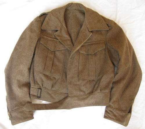 SA BUNNY JACKET LABELLED & DATE 1949-SIZE MEDIUM-MEASURES 53CM ARMPIT TO ARMPIT-SOME DAMAGE IN THE F