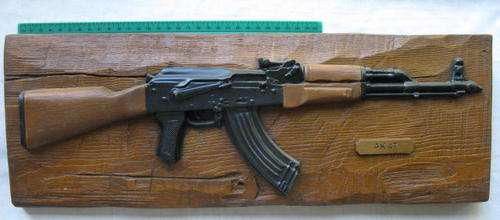 WALL MOUNT OF THE AK 47 MADE FROM RESIN -MEASURES 48X17CM