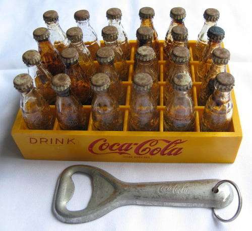VINTAGE COCA COLA CRATE WITH 24 BOTTLES-MEASURES 15-10 CM-SOLD WITH OLD COCA COLA BOTTLE OPENER