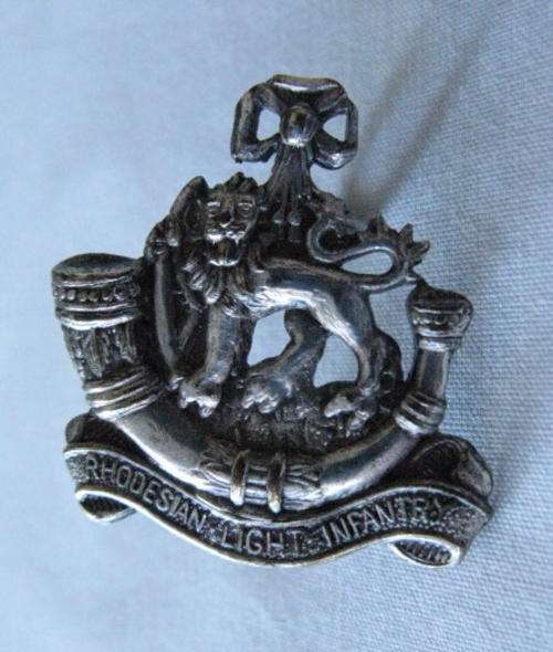 RHODESIAN LIGHT INFANTRY OFFICERS (STERLING SILVER) CAP BADGE WORN 1972 - 1980 - 2 LUGS