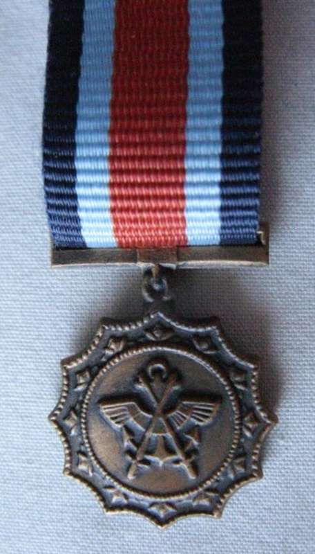 MILITARY MERIT MINIATURE MEDAL WITH RIBBON