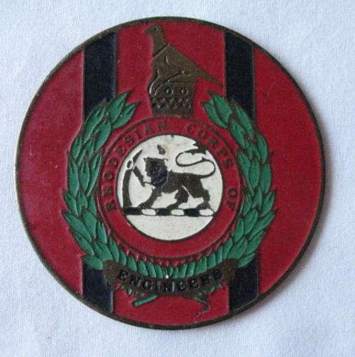 RHODESIAN ENGINEERS, BLUE, RED, GREEN AND WHITE ENAMEL ON BRASS STABLE BELT PLATE AS WORN ON THE CHR