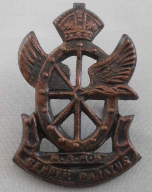 SA RAILWAY AND HARBOURS BRIGADE GILDING METAL CAP BADGE WORN 1921 - 1929 AND 1940 - 1951 - LUGS INTA