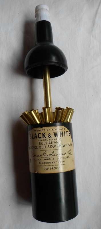 VINTAGE BLACK & WHITE CIGARETTE BOTTLE-CIRCA 1970'S COMES WITH LIGHTER ON TOP