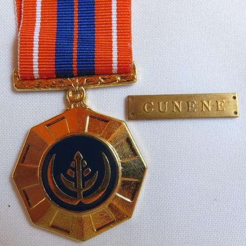 FULL SIZE PRO PATRIA MEDAL-NUMBERED AT BACK FLUSH EPOXY WITH CUNENE BAR