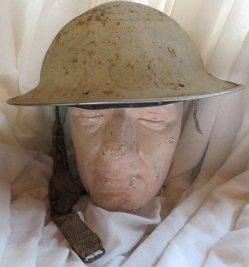 WW2 BRITISH MARK 2 STEEL HELMET WITH PAINT FOR USE IN THE DESERT