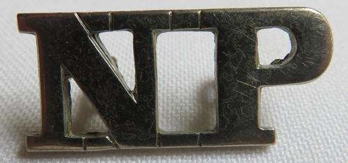 NYASALAND POLICE ,WHITE METAL TITLE - 2 LUGS