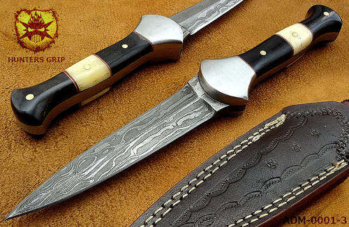 A BEAUTIFUL HAND MADE DAMASCUS MINI DAGGER