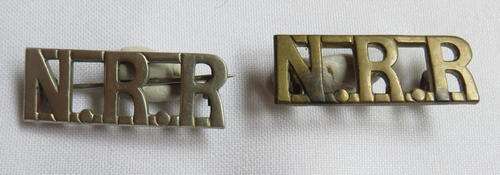NATAL ROYAL RIFLES SHOULDER TITLE PAIR-THE ONE BRASS THE OTHER WHITE METAL