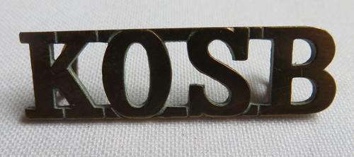 KING'S OWN SCOTTISH BORDERS BRASS TITLE-2 LUGS