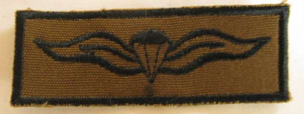 NO. 2650)  PARACHUTIST QUALIFICATION BADGE - BLACK EMBROIDERED ON NUTRIA - WORK DRESS.